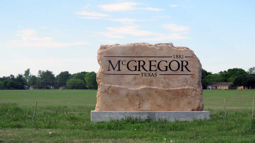 Custom commercial sign made of engineered stone in Houston by Bedrock Boulders