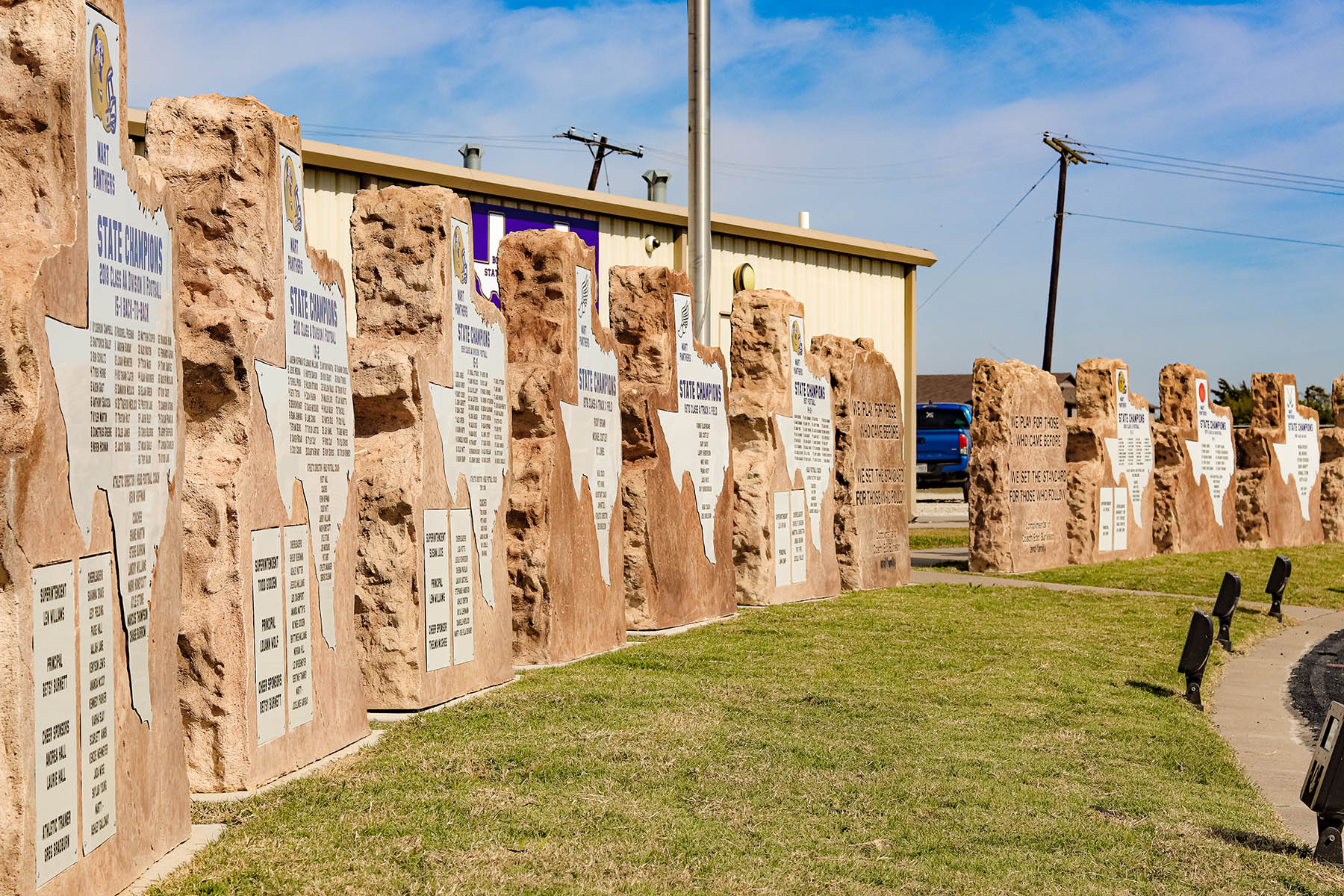 Custom commercial sign made of engineered stone in Houston by Bedrock Boulders