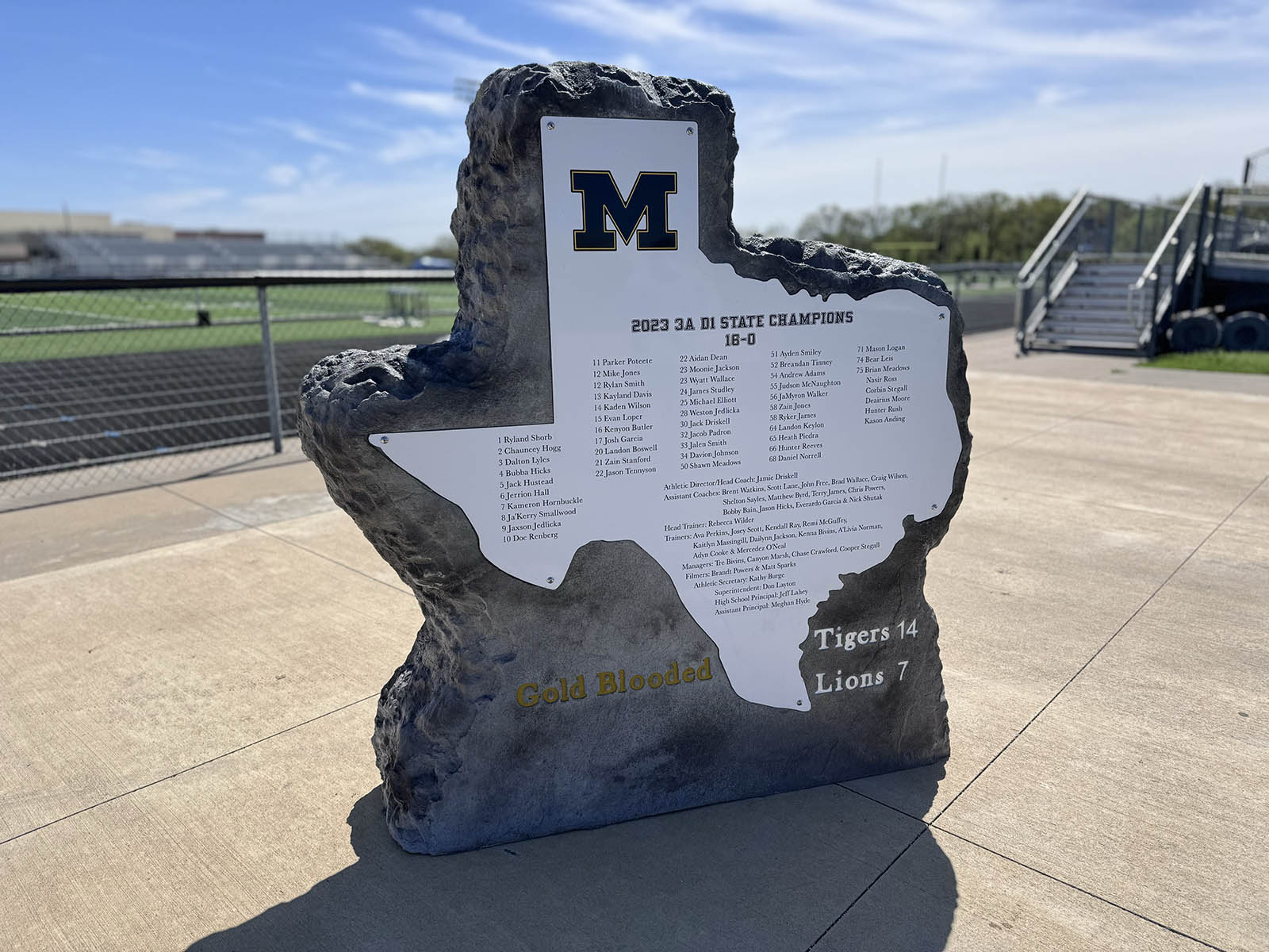 Custom commercial sign made of engineered stone in Houston by Bedrock Boulders