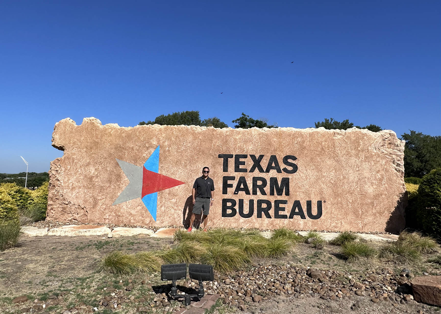 Custom commercial sign made of engineered stone in Houston by Bedrock Boulders