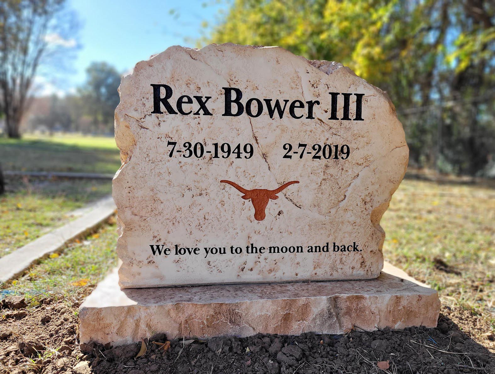 Custom headstone made of engineered stone in Houston by Bedrock Boulders