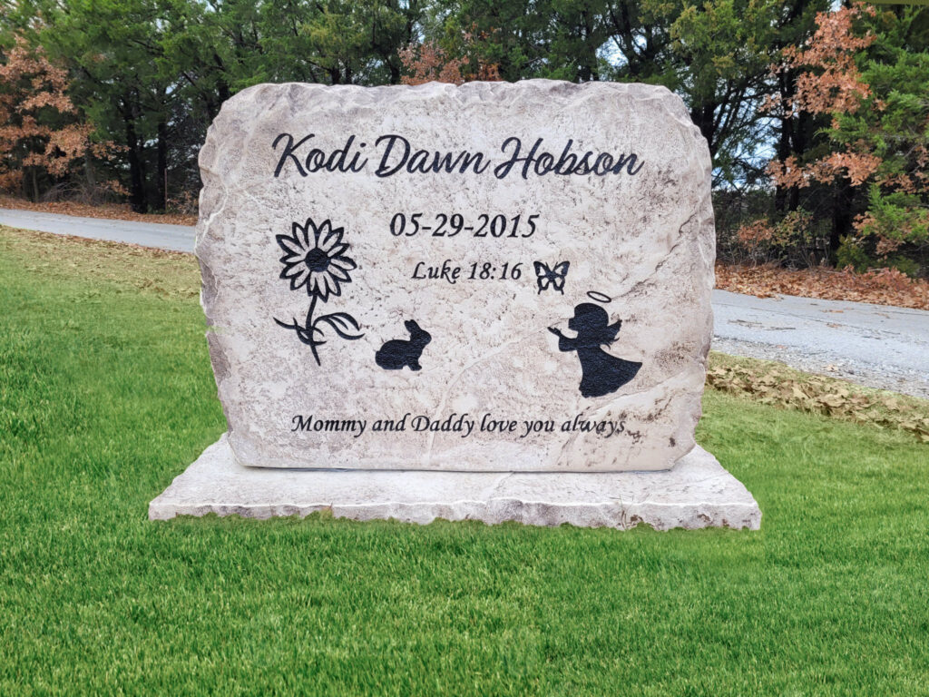 Custom headstone made of engineered stone in Houston by Bedrock Boulders