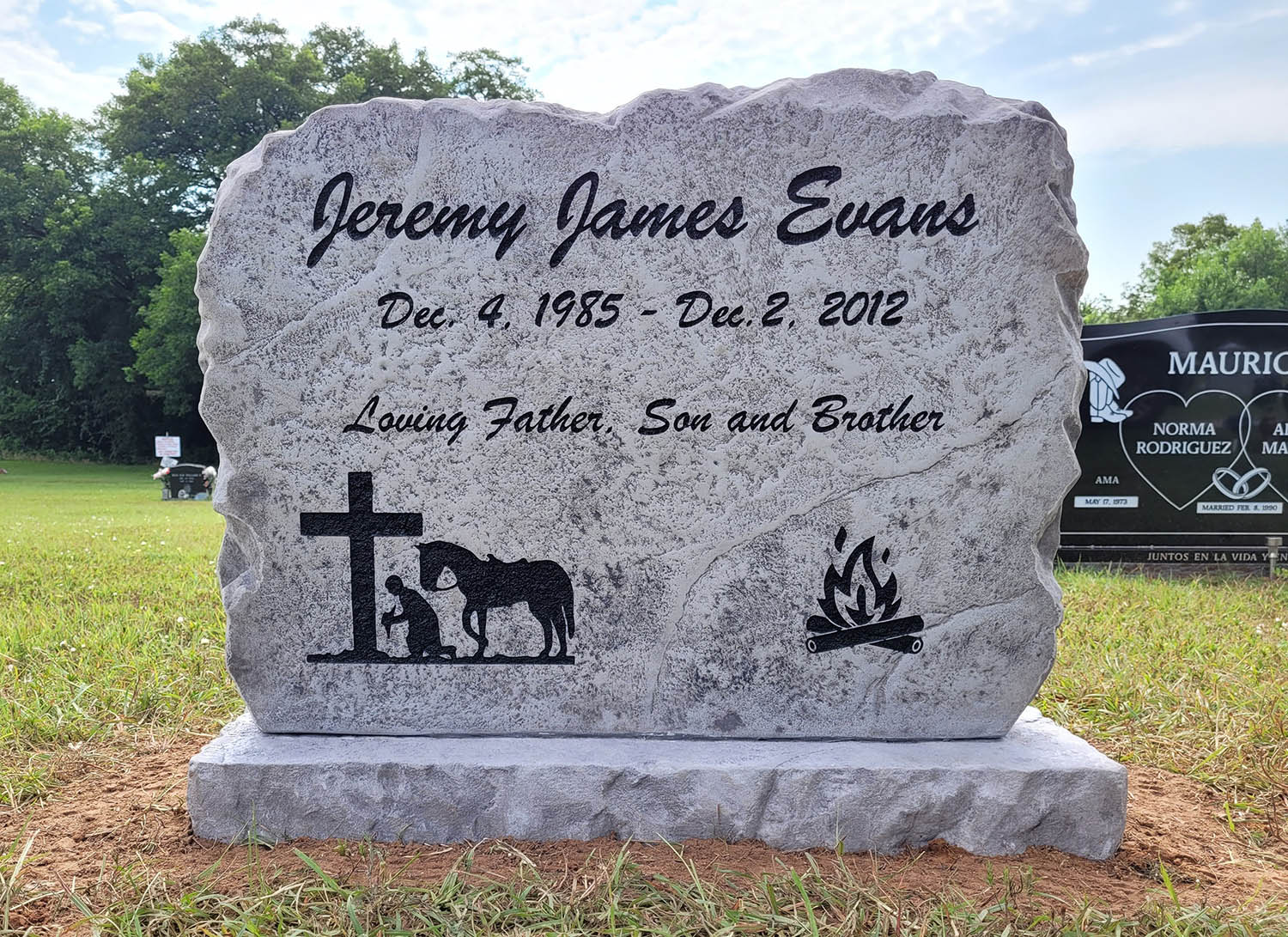 Custom headstone made of engineered stone in Houston by Bedrock Boulders