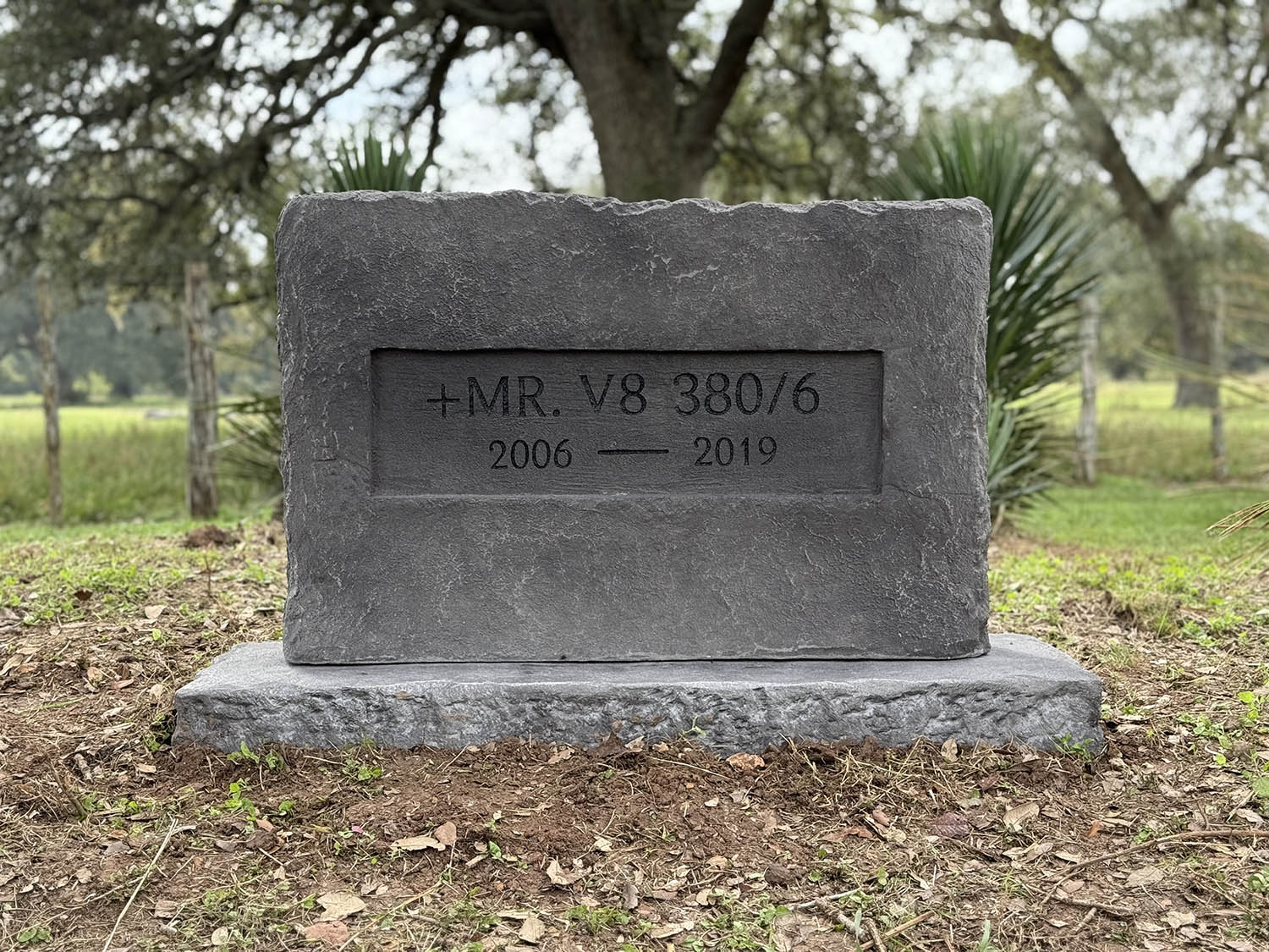 Custom headstone made of engineered stone in Houston by Bedrock Boulders