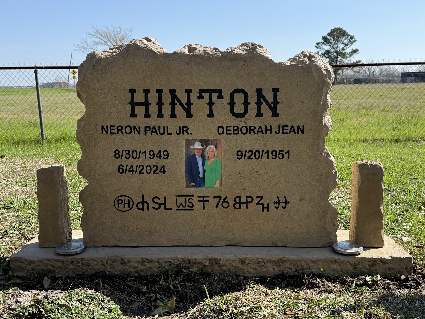 Custom headstone made of engineered stone in Houston by Bedrock Boulders.