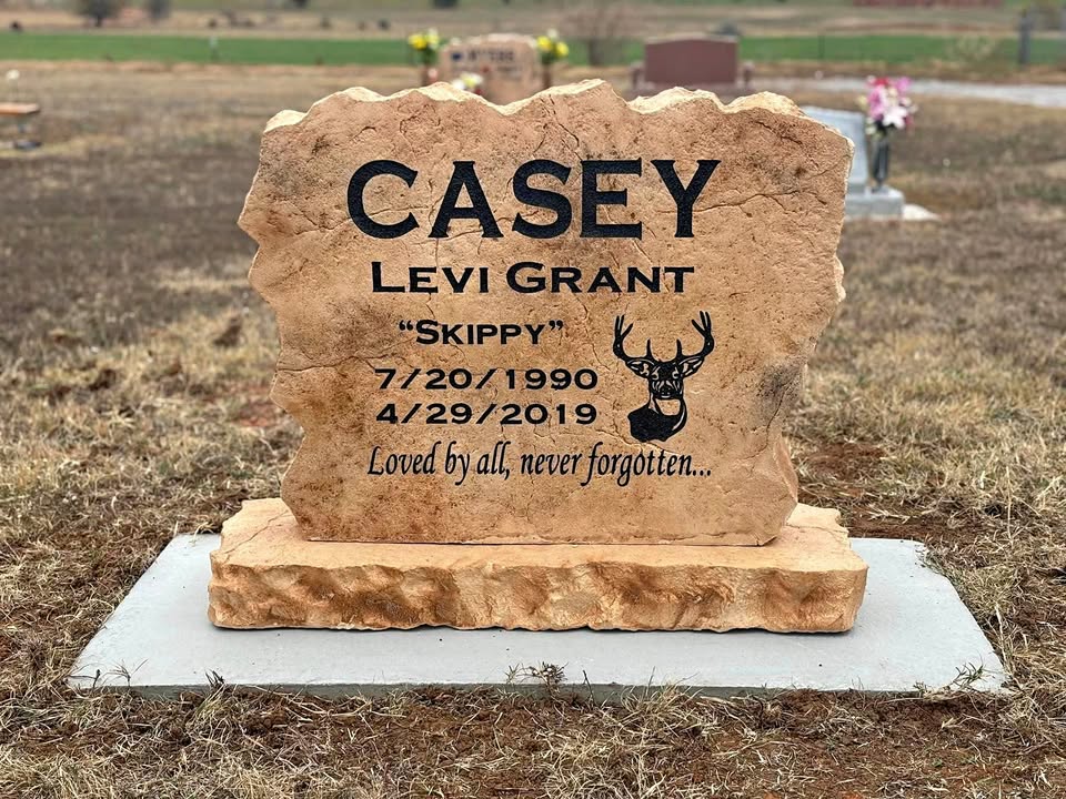 Custom headstone made of engineered stone in Houston by Bedrock Boulders.