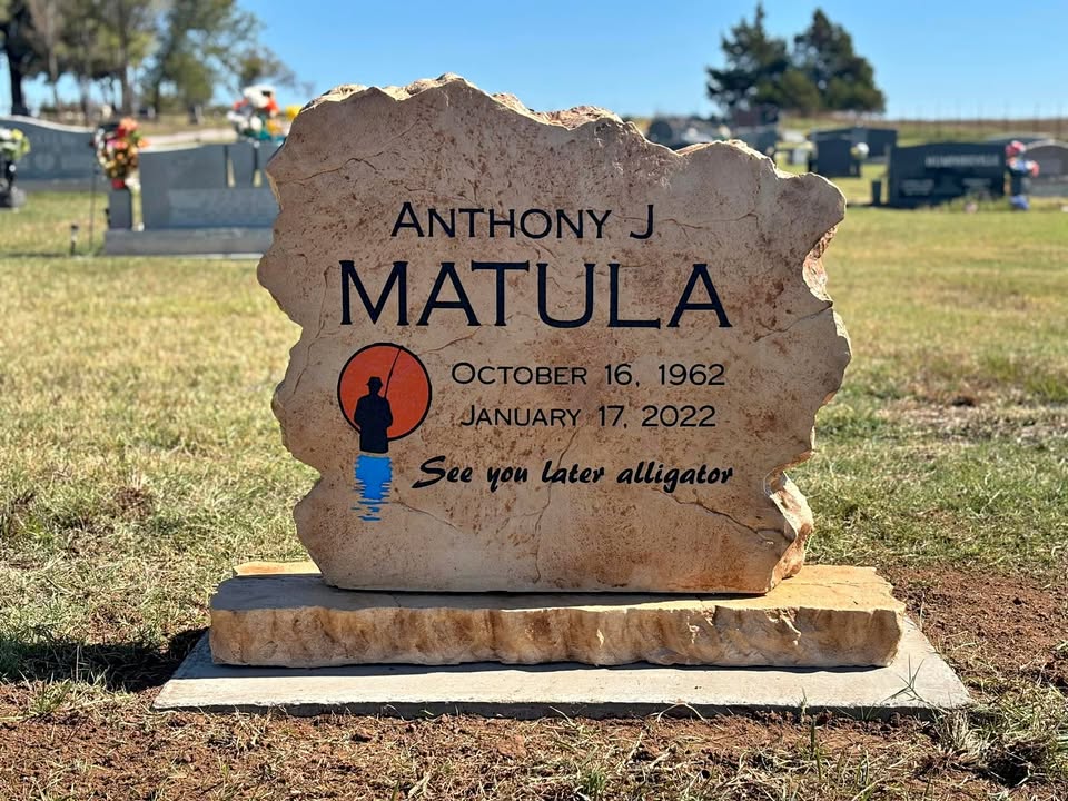 Custom headstone made of engineered stone in Houston by Bedrock Boulders.