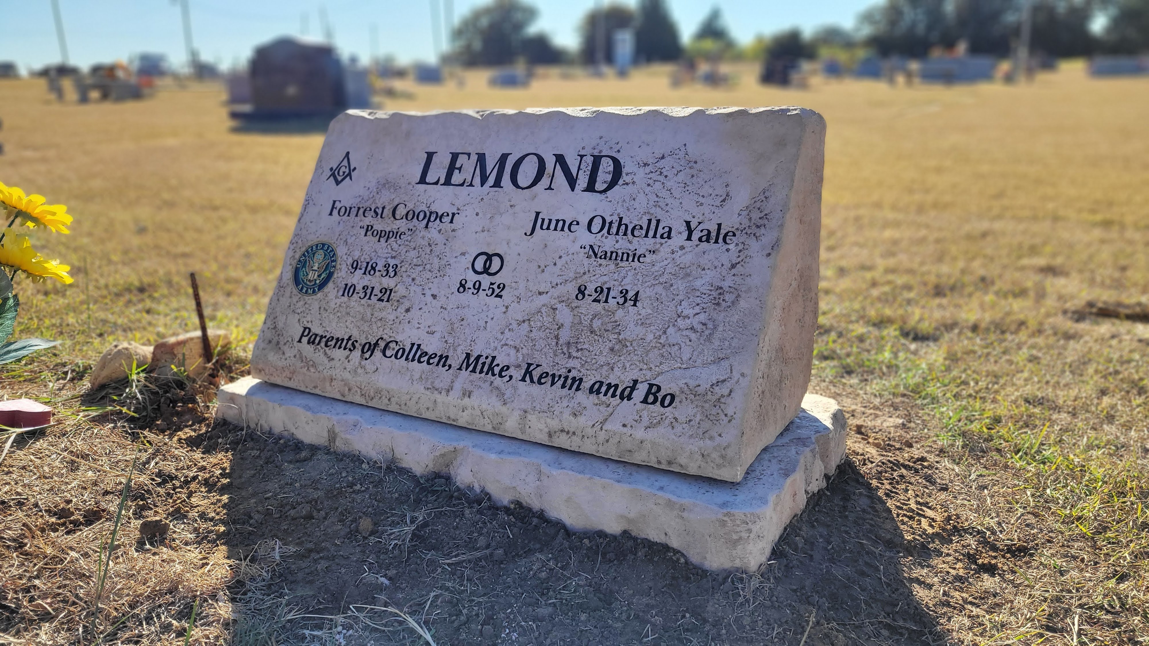 Custom headstone made of engineered stone in Houston by Bedrock Boulders.