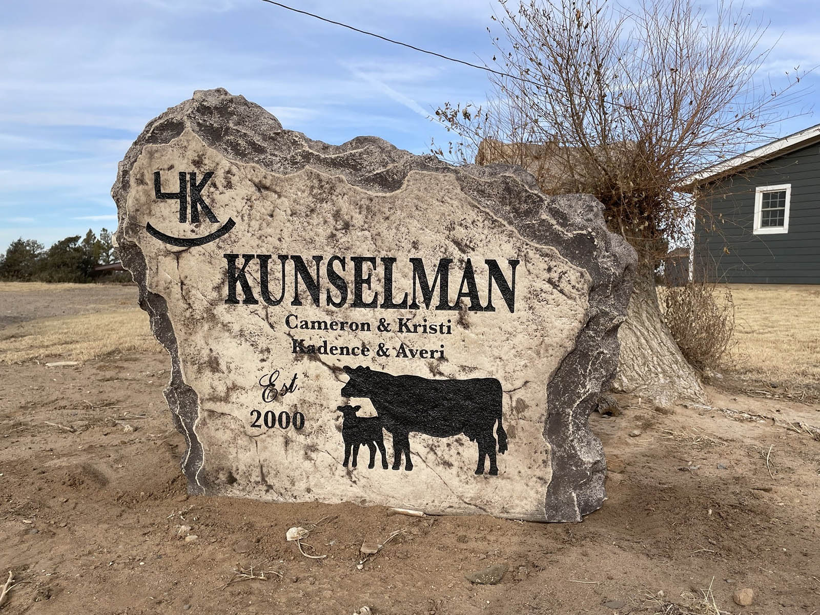 Custom ranch sign made of engineered stone in Houston by Bedrock Boulders