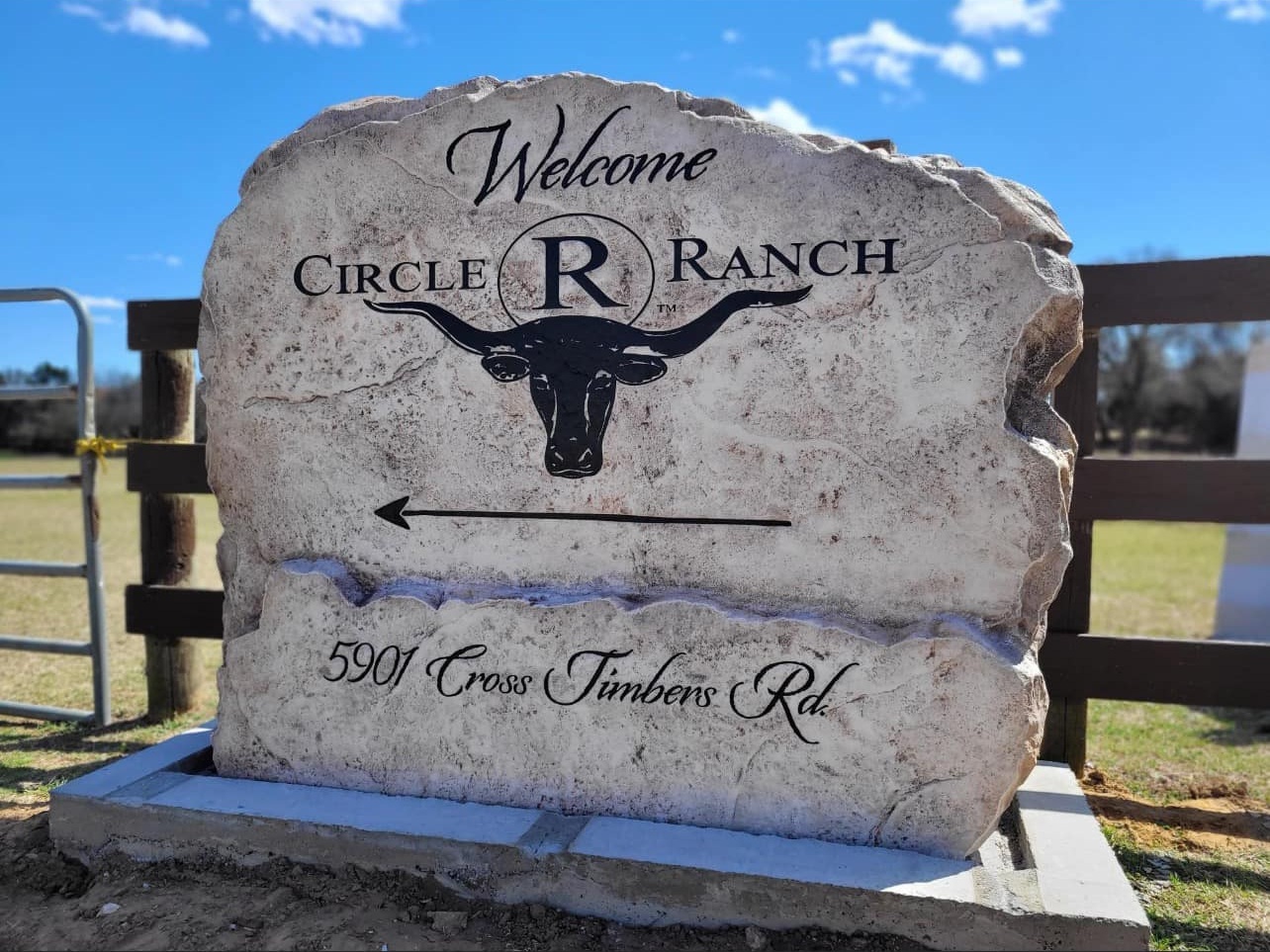 Custom ranch sign made of engineered stone in Houston by Bedrock Boulders.