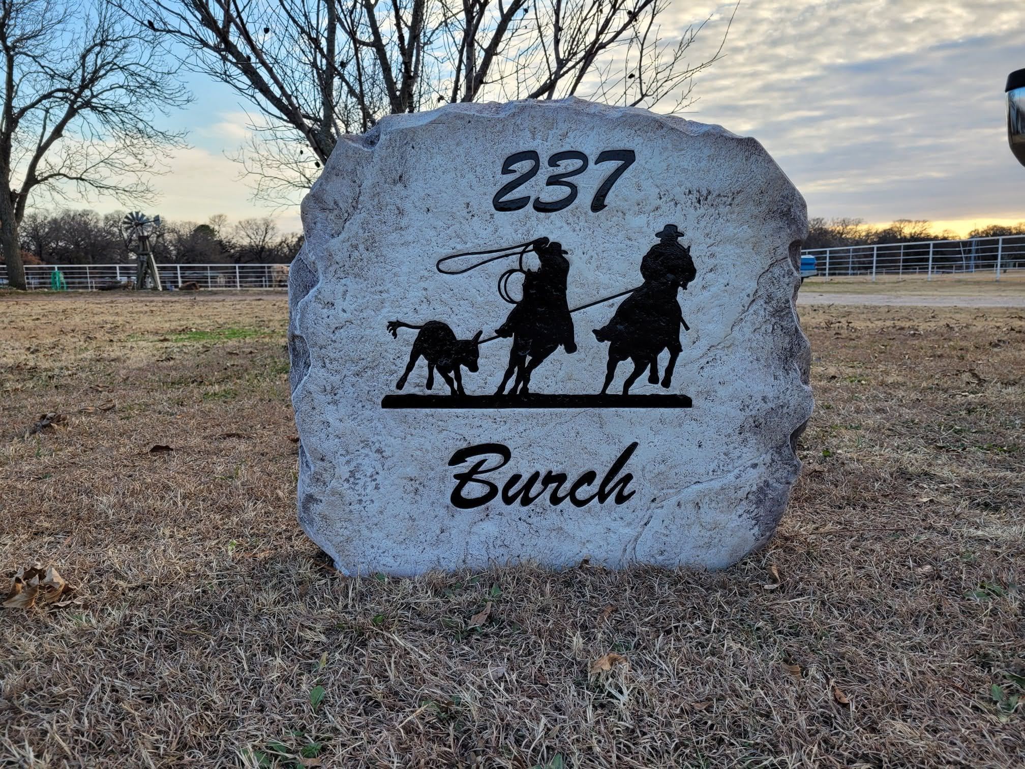 Custom ranch sign made of engineered stone in Houston by Bedrock Boulders.