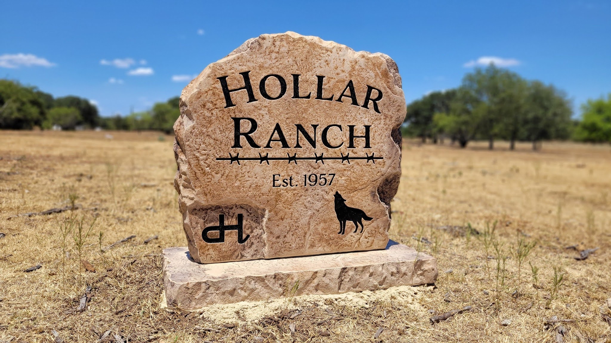 Custom ranch sign made of engineered stone in Houston by Bedrock Boulders.